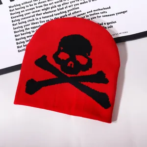 Y2K gothic knitted beanie in vibrant red with a black skull and crossbones jacquard pattern