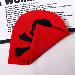 Y2K gothic red knit beanie hat featuring a black skull and crossbones jacquard pattern