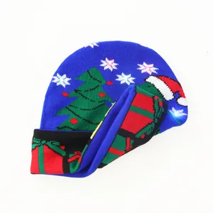 Bonnet de Noël en tricot bleu avec LED lumineuses et motifs festifs de flocons