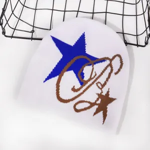White Y2K knitted beanie with blue star pattern and brown street style graphic design