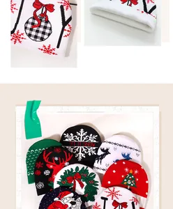 Detailed knit pattern on Christmas beanie featuring snowflake and festive reindeer motifs