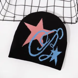 Black knitted beanie hat with stylish pink star and blue letter G graphic patterns