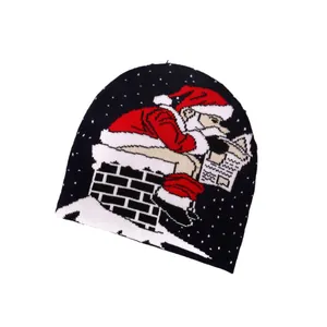 Black Christmas jacquard beanie featuring Santa Claus reading by a snowy chimney
