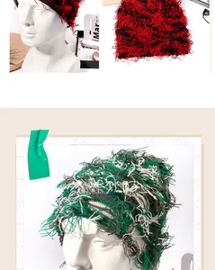 Detail of colorful knit beanie with fuzzy tassel textures and camouflage fringe pattern