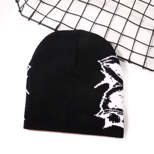 Black street style jacquard knit beanie with white abstract pattern for autumn and winter