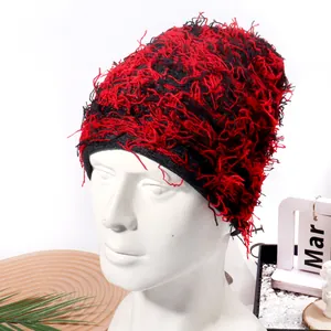 Fuzzy camouflage knit beanie in red and black feather yarn for a stylish winter look