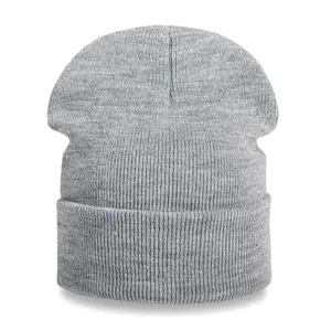 Minimalist dark grey ribbed knit beanie hat with a classic wide folded cuff for winter warmth