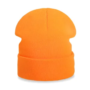 Classic bright orange ribbed knit beanie hat with cuffed design for men and women