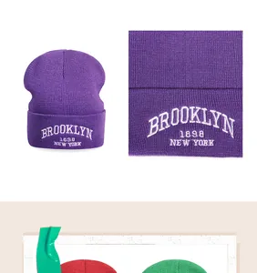 Close-up of purple Brooklyn 1898 embroidery on a thick cuffed knit beanie hat