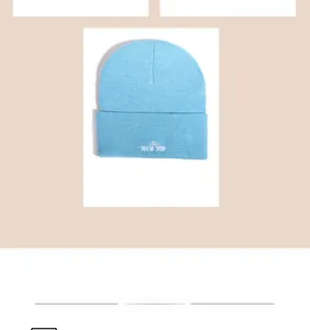 Detailed close-up of light blue knit beanie with Brooklyn 1898 white embroidery detail