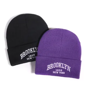 Black and purple knit beanie featuring Brooklyn 1898 New York white embroidery