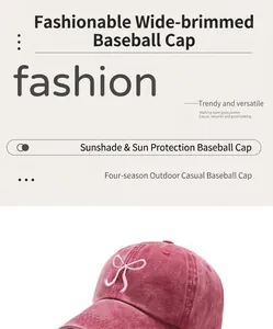 Close-up of bowknot embroidery on vintage washed cotton denim baseball cap in dark pink