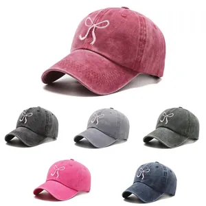 Bow embroidery washed cotton baseball caps in multiple colors with a soft top design