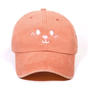 Vintage washed cotton baseball cap in coral orange with cute cartoon animal embroidery
