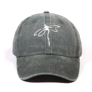 Washed dark grey baseball cap with minimalist white dragonfly print on cotton canvas