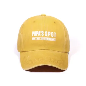 Classic washed mustard yellow baseball cap with artistic letter print in a soft top style