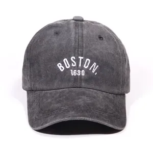 Washed dark grey denim baseball cap featuring white BOSTON embroidery and a curved brim