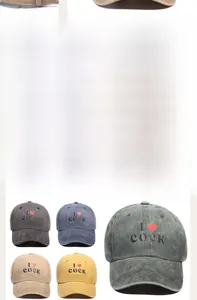 Detail of washed cotton baseball caps in multi-color options with embroidered logo