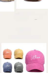 Close-up of assorted cotton baseball caps with embroidered Let Them heart logo design