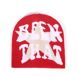 Red Y2K style beanie with 'BEEN THAT' text and star pattern on thick knitted fabric