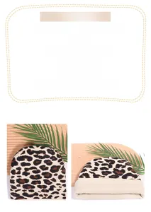 Close-up of thick leopard jacquard knit fabric showing soft texture and folded cuff