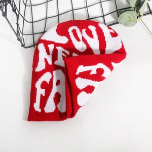 Street style red and white jacquard knit beanie featuring LOVE lettering patterns