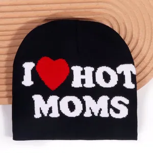 Black knit beanie featuring a red heart and white I HOT MOMS jacquard lettering