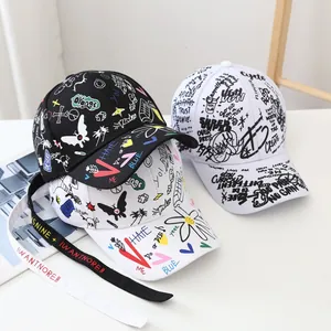 Detail of street graffiti baseball cap featuring long adjustable straps and cotton fabric