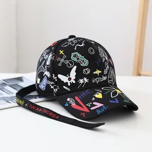 Detail of graffiti baseball cap with colorful hand-painted prints and long strap
