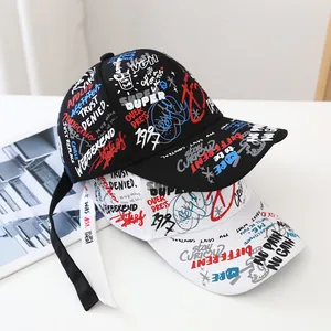 Graffiti print baseball cap with street style long strap in black and white colors
