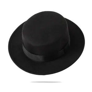 Classic black wool felt boater hat with flat top and wide brim for British vintage style