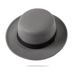 Detailed view of dark grey wool felt boater hat with a black grosgrain ribbon band