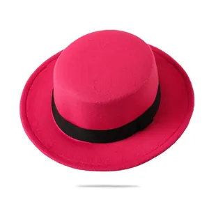 Top view of rose red wool boater hat with black grosgrain ribbon and flat brim