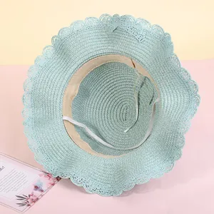 Light blue wide brim straw sun hat for kids featuring elegant wavy scalloped edges