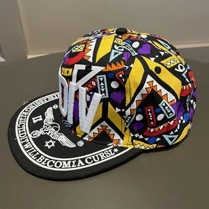 Macro detail of graffiti baseball cap with tribal pattern and embroidered DIV lettering