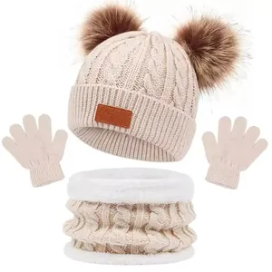 Kids winter 3-piece set with pompom knit hat, warm scarf, and gloves in beige