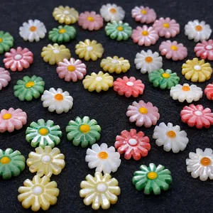 Detailed close-up of colorful daisy shell beads for DIY jewelry making and crafts