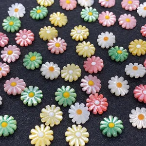 Detailed view of white shell sun flower daisy beads for DIY jewelry bracelet