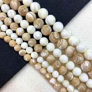 Natural trochus shell beads in white and beige with swirl texture for DIY jewelry making