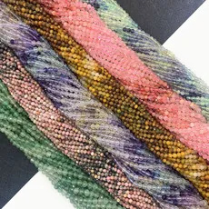 Detailed view of assorted multi-color faceted 2mm to 4mm natural stone beads for DIY jewelry