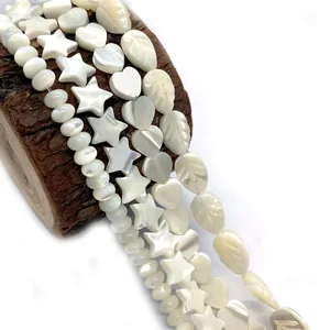 Natural white shell beads in star, heart and leaf shapes for DIY jewelry making