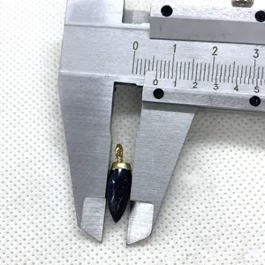 Detail showing blue sandstone bullet pendant dimensions measured by a caliper