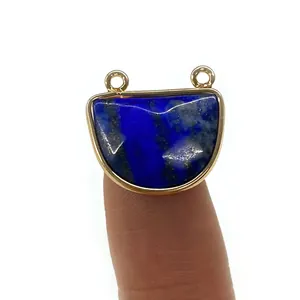 Halfronde lapis lazuli connector met goudlaag en dubbele ringen voor sieraden