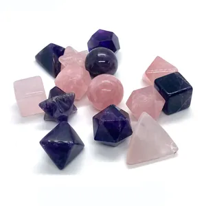 Geometric rose quartz and amethyst crystal set with sphere, cube, and star shapes