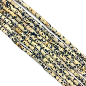 Macro shot of natural Dalmatian Jasper cylinder stone beads for DIY jewelry making
