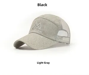 Detail of light grey mesh baseball cap with premium linen texture and M letter embroidery