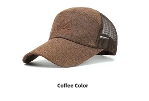 Detail view of coffee mesh baseball cap featuring breathable fabric and M letter embroidery