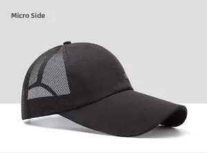 Micro side view of black mesh baseball cap showing breathable texture and curved brim