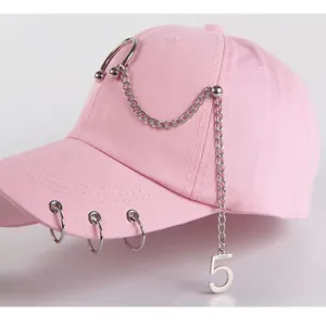 Pink cotton baseball cap with silver metal chains and fashion number five pendant