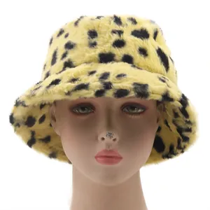Detail of yellow leopard print faux mink fur bucket hat with soft plush texture
